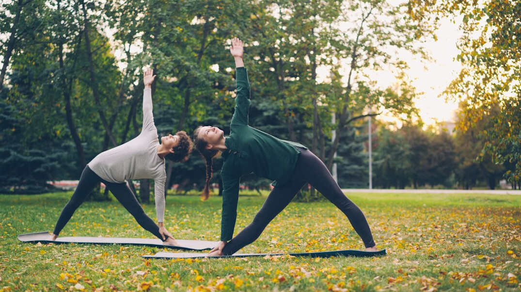person stretching outdoors