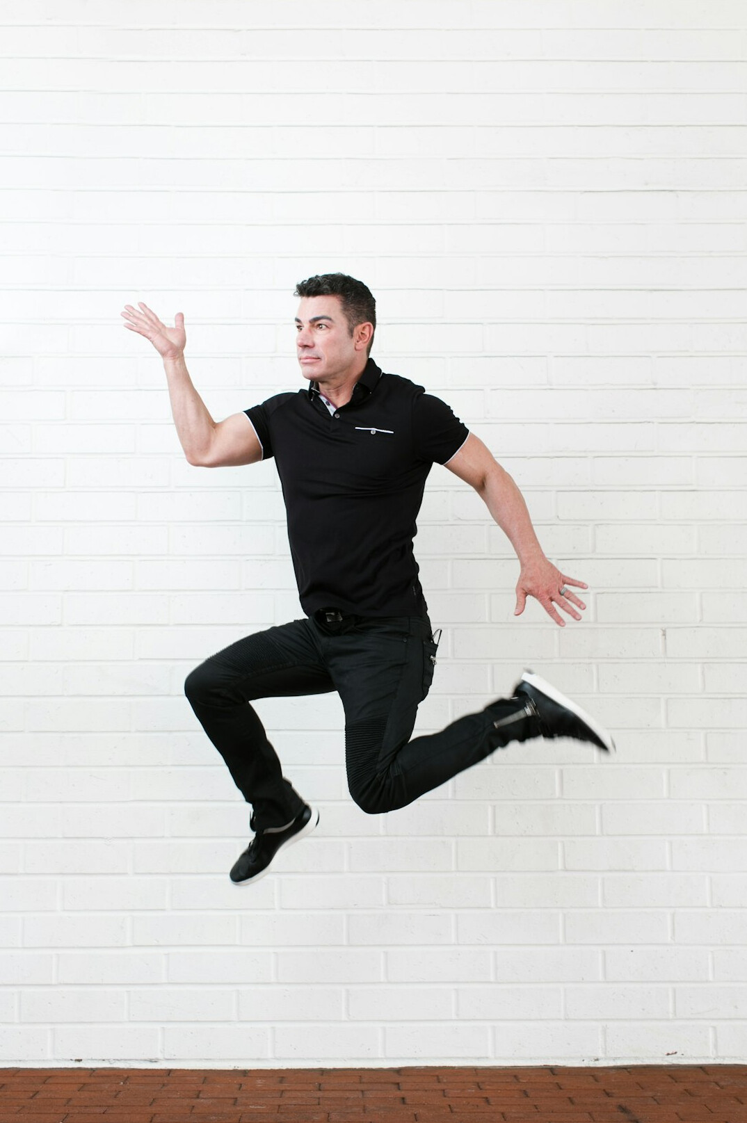 Professional headshot of a Malay male physiotherapy course instructor