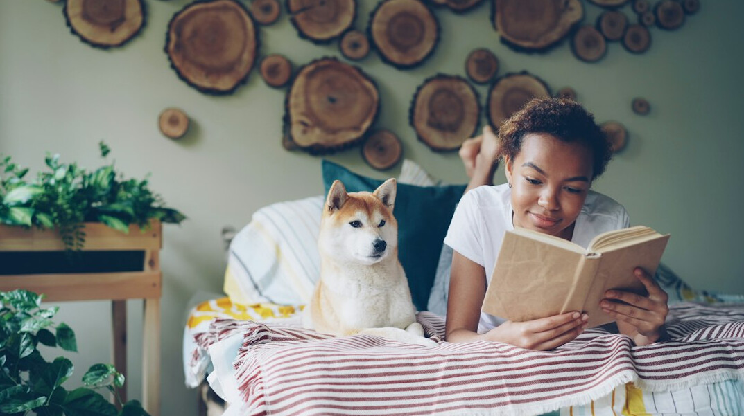 person reading health book at home