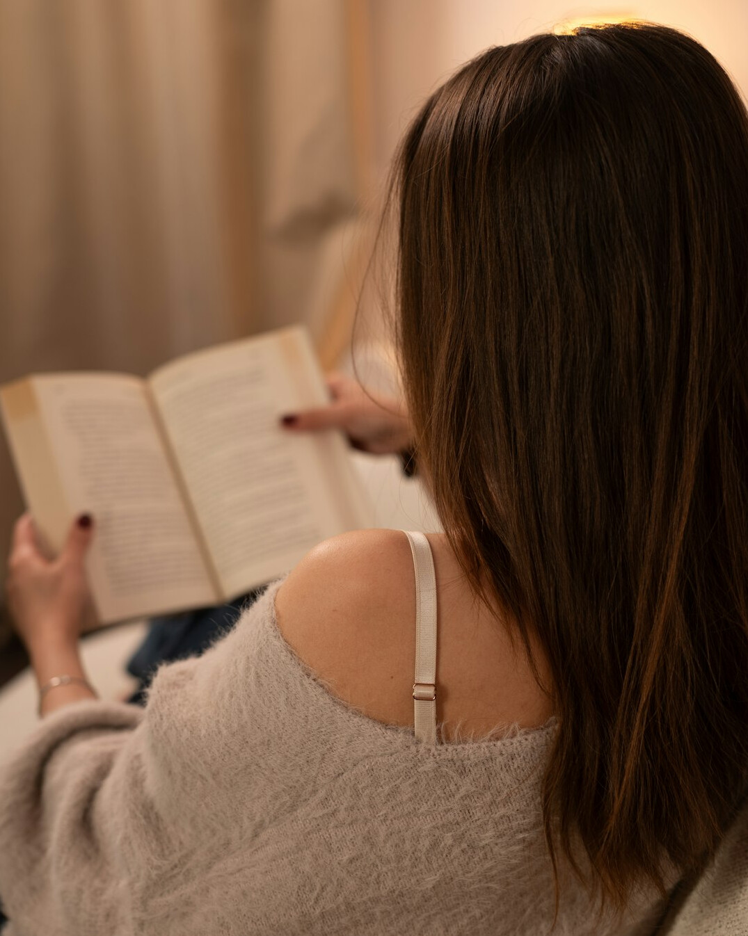 person reading health book at home